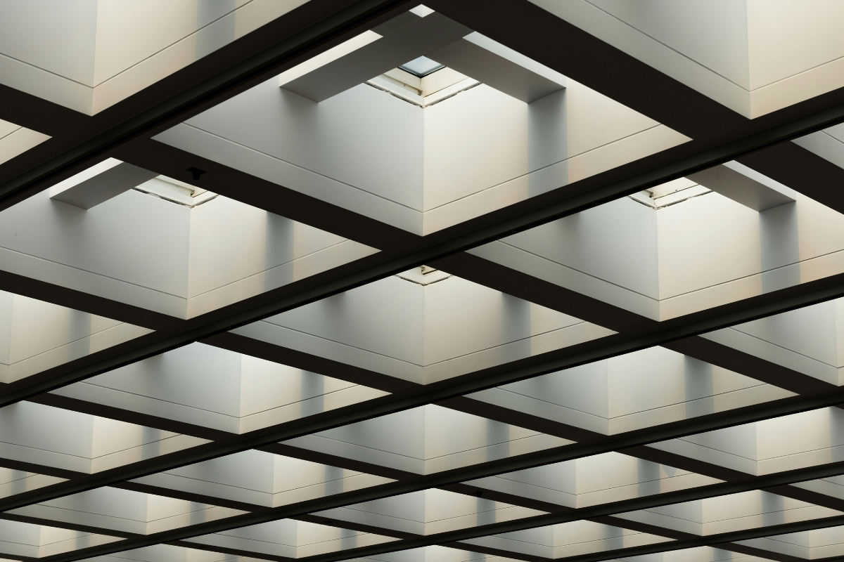 Modern tray ceiling with soft hidden lighting in stylish living room