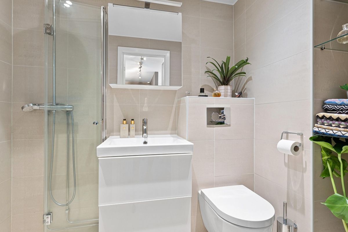Easy DIY bathroom decor ideas with framed mirror makeover