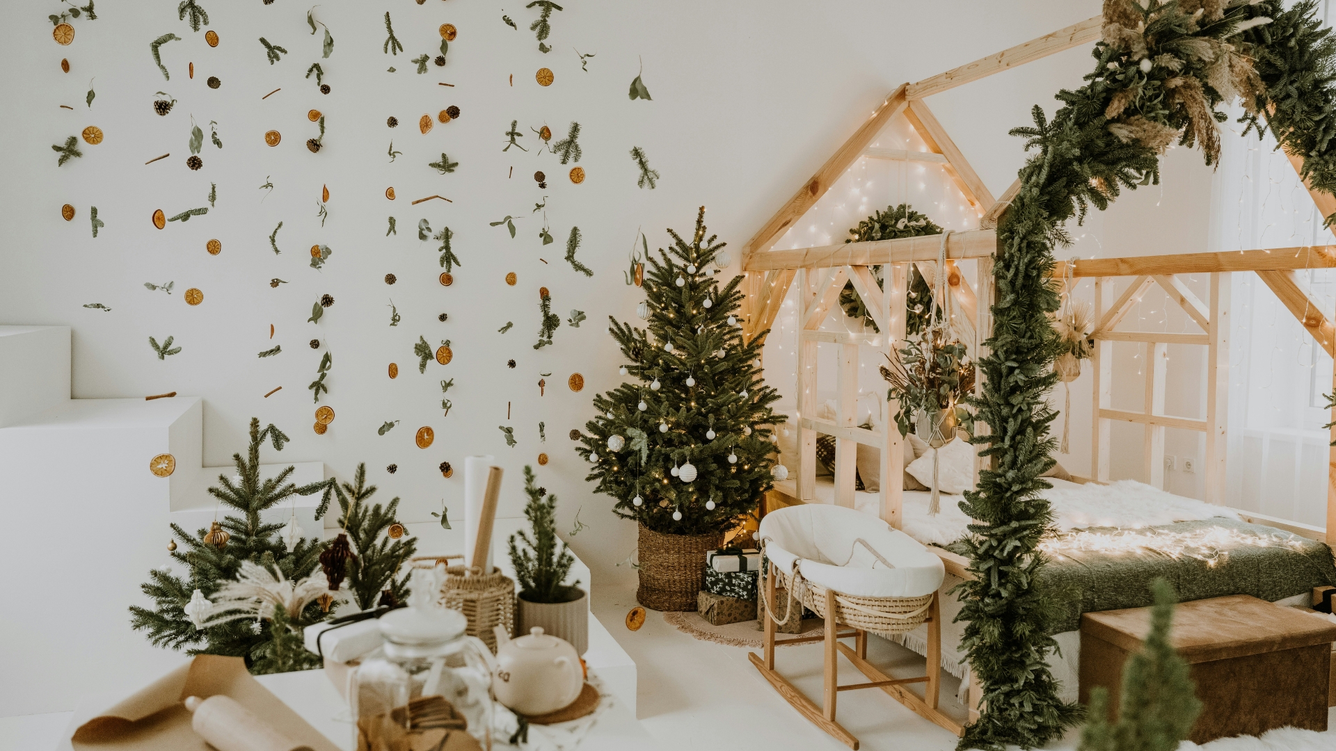 Living room styled for winter after Christmas with neutral tones, cozy throws, warm lighting, and minimal elegant decor creating a calm and inviting atmosphere.