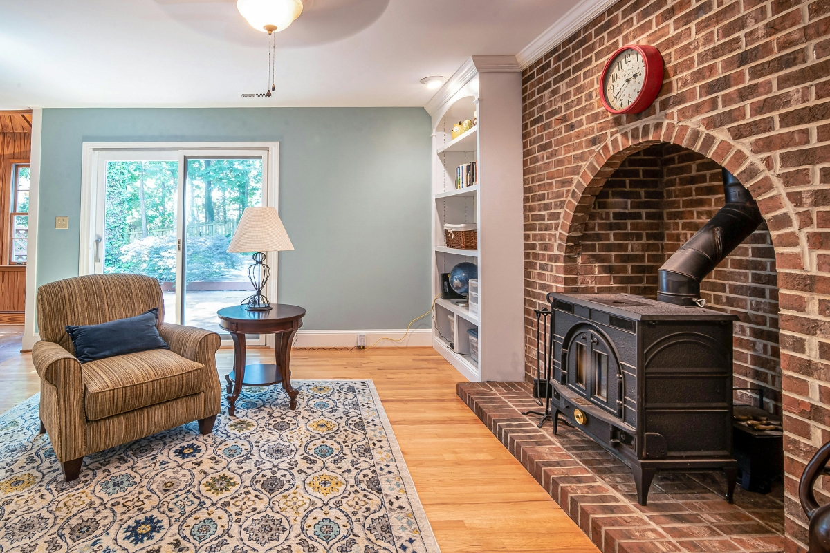 Living room with a layered rug setup for a cozy winter home feel