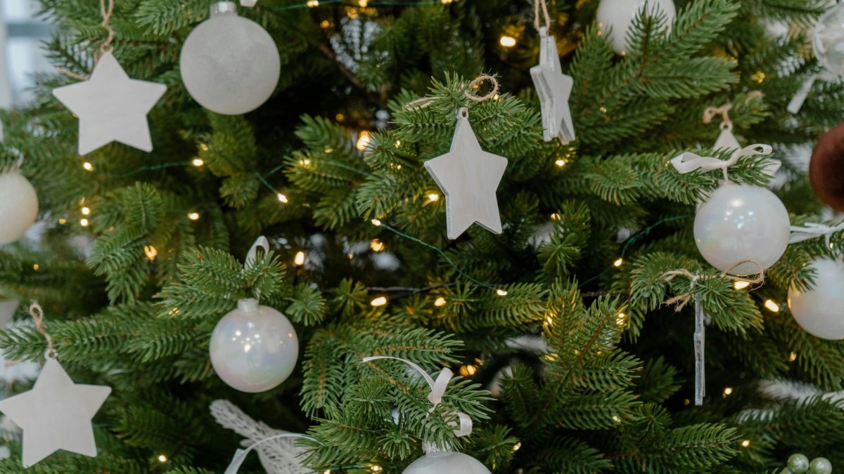 Elegant winter living room styled with neutral tones, soft textures, warm lighting, and minimal decor creating a calm space after holiday decorations are removed.
