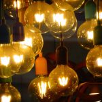 Soft indirect LED lighting behind TV unit creating a warm, modern home ambience with hidden lights and cozy interior decor.