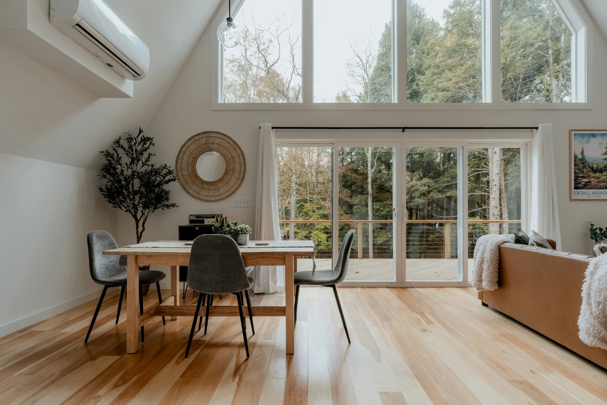 Warm and cozy living space styled with fall 2026 decor trend elements including deep tone accents, soft layered textiles, and comfort-focused interior details