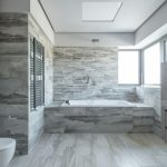 Minimal bathroom with neutral color palette and clutter-free surfaces