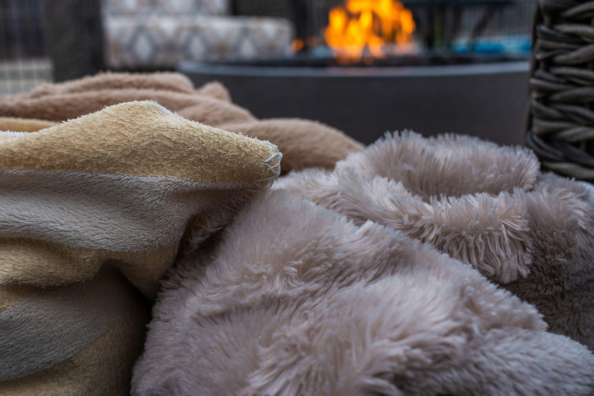 Living room styled with mixed textures and fabrics for a cozy winter feel