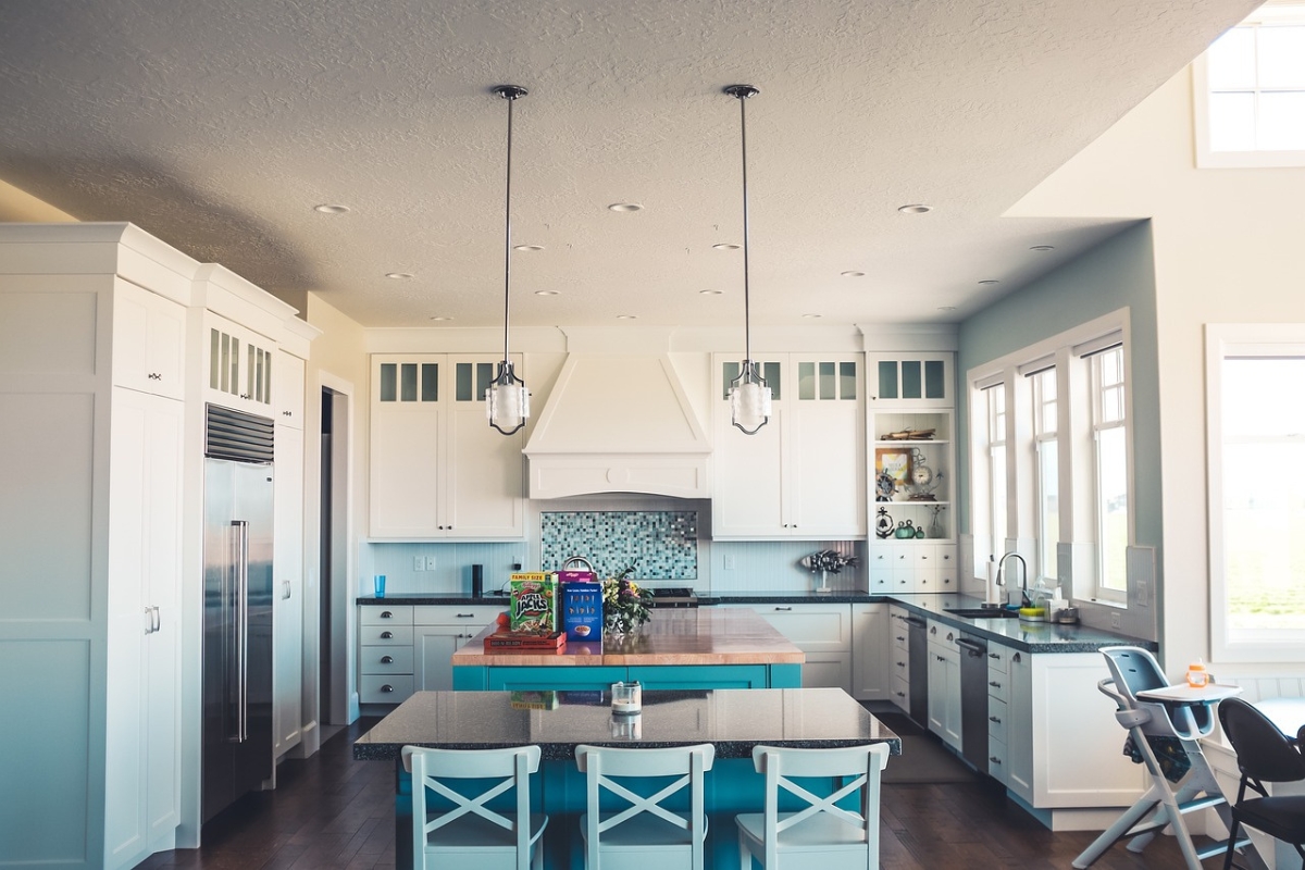 Open dining room with curved furniture and organic flowing layout