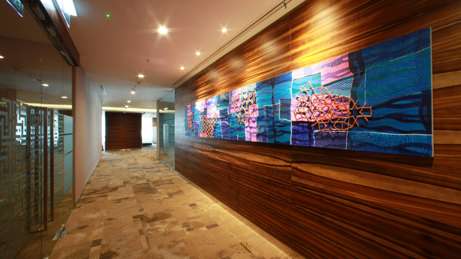 Oversized abstract wall art above modern living room sofa creating a bold focal point