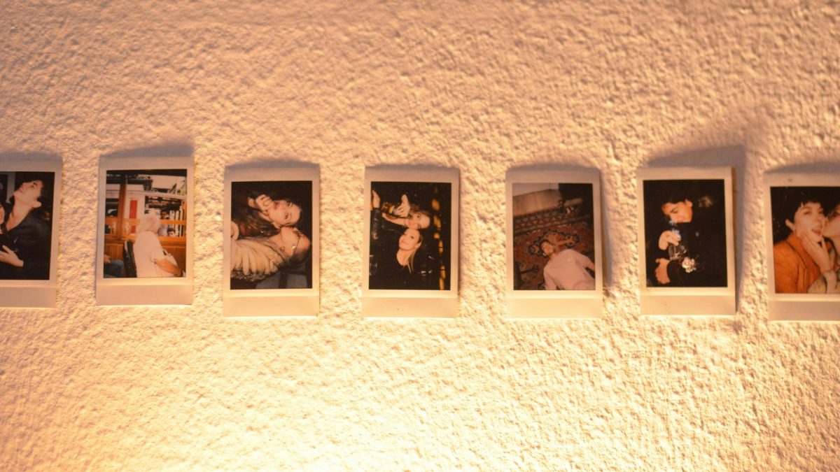 Modern living room wall with personalized family photos in sleek frames