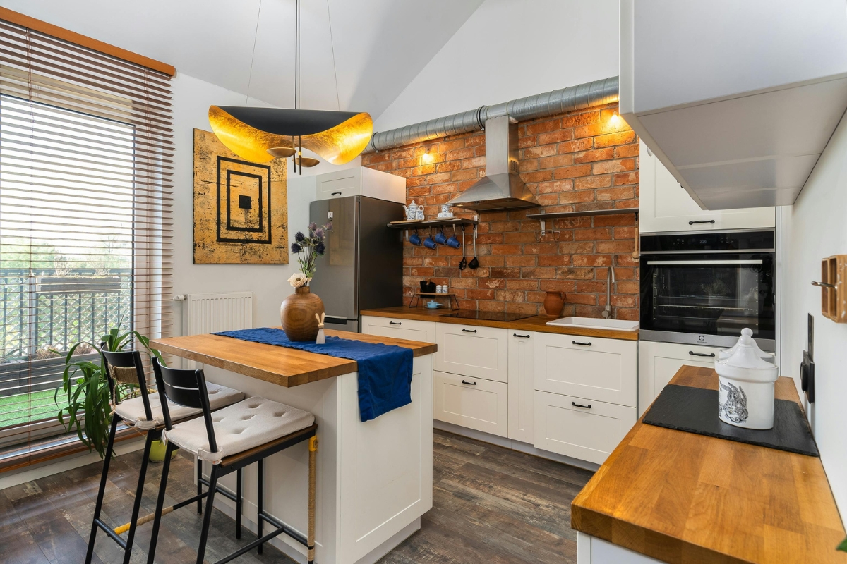 Kitchen with a bold-colored accent wall behind the stove, demonstrating the perfect wall choice for maximum visual impact and style