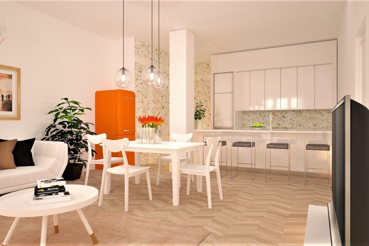 Modern dining room with pendant light hung at ideal height above rectangular table, creating balanced and comfortable lighting.