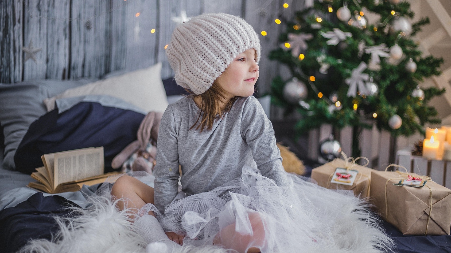 Cozy neutral living room styled with textured pillows and warm lighting after Christmas