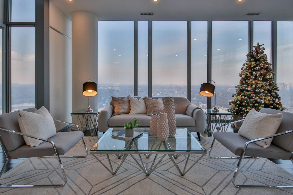 Living room with holiday decorations removed and surfaces cleared, creating a clean, calm, and elegant winter-ready space.