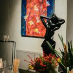 Modern sculptural lighting fixture in a living room serving as a stylish and artistic centerpiece, creating ambient and decorative lighting.