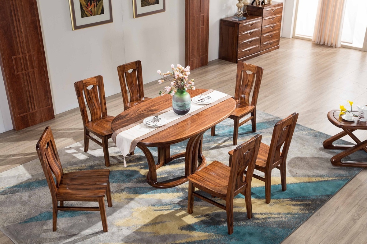 oft, rounded dining chairs around a modern table in a cozy dining room