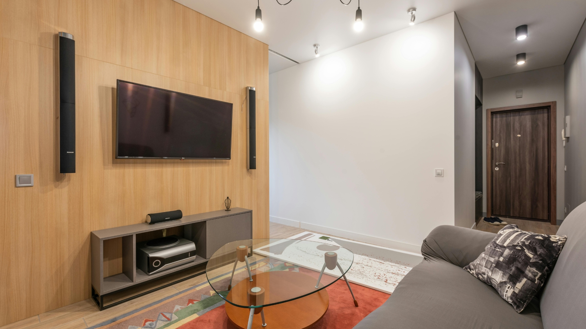 Space Smart Furniture Designs featuring foldable desk, storage sofa, and multifunctional furniture in a compact modern home