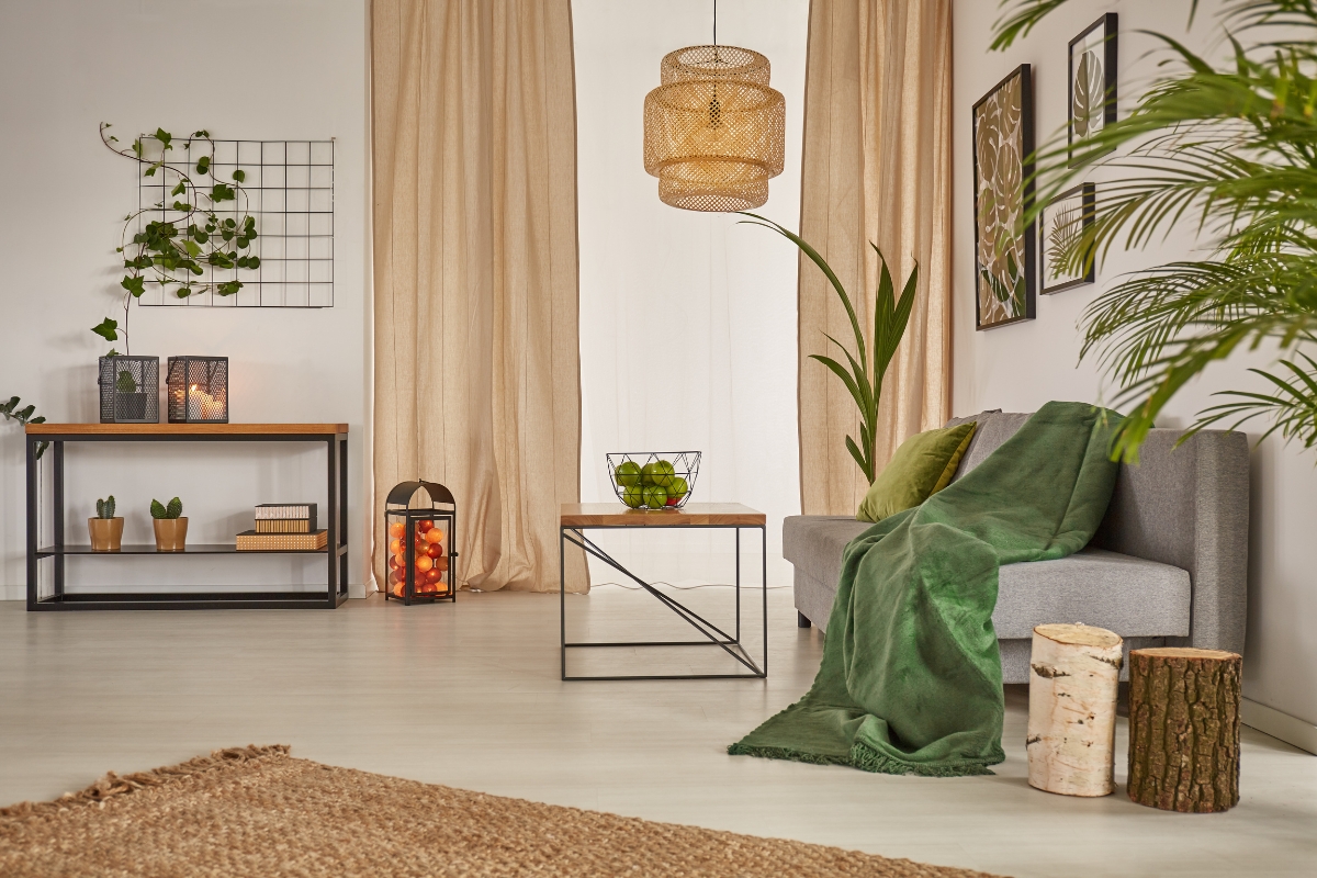 Living room with natural wood furniture and linen textiles in biophilic decor