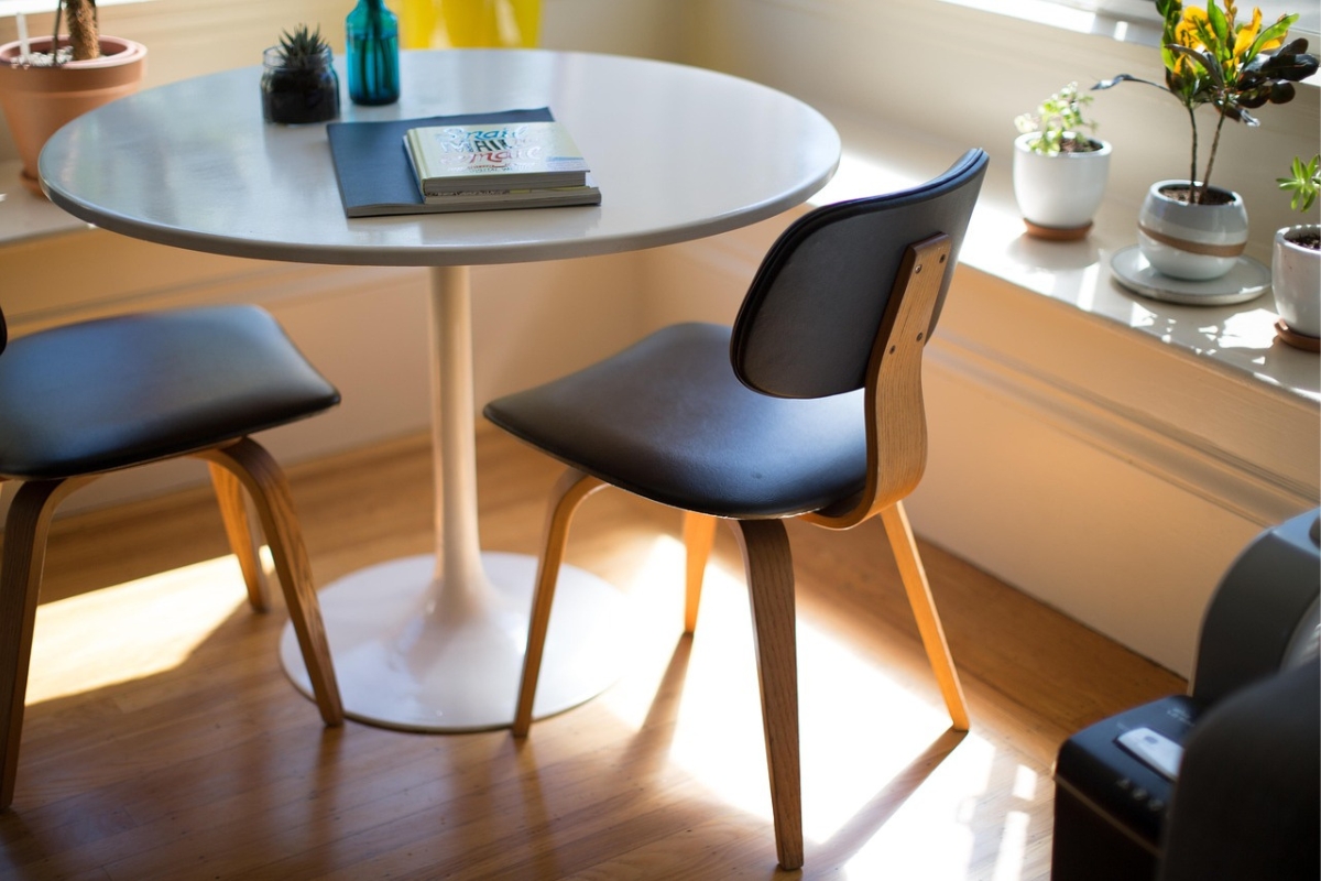 Curved waterfall acrylic side table in a modern living room