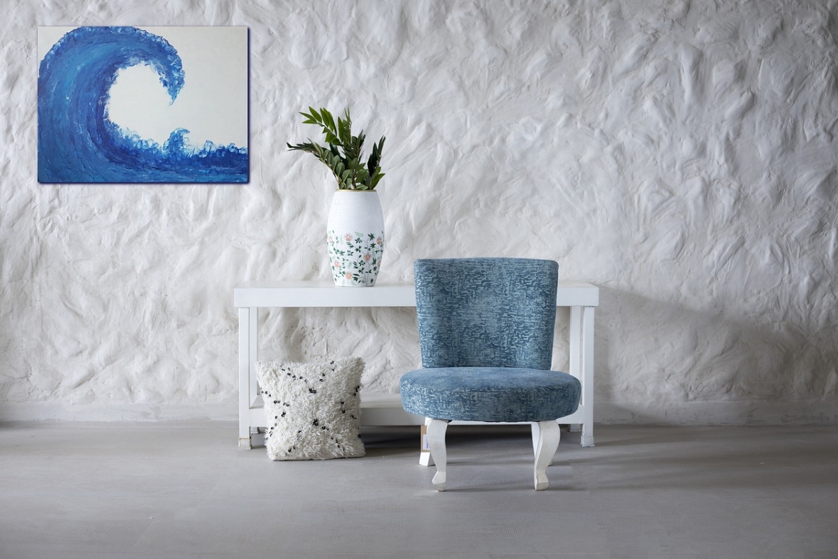 Floating Lucite console table in a bright modern entryway