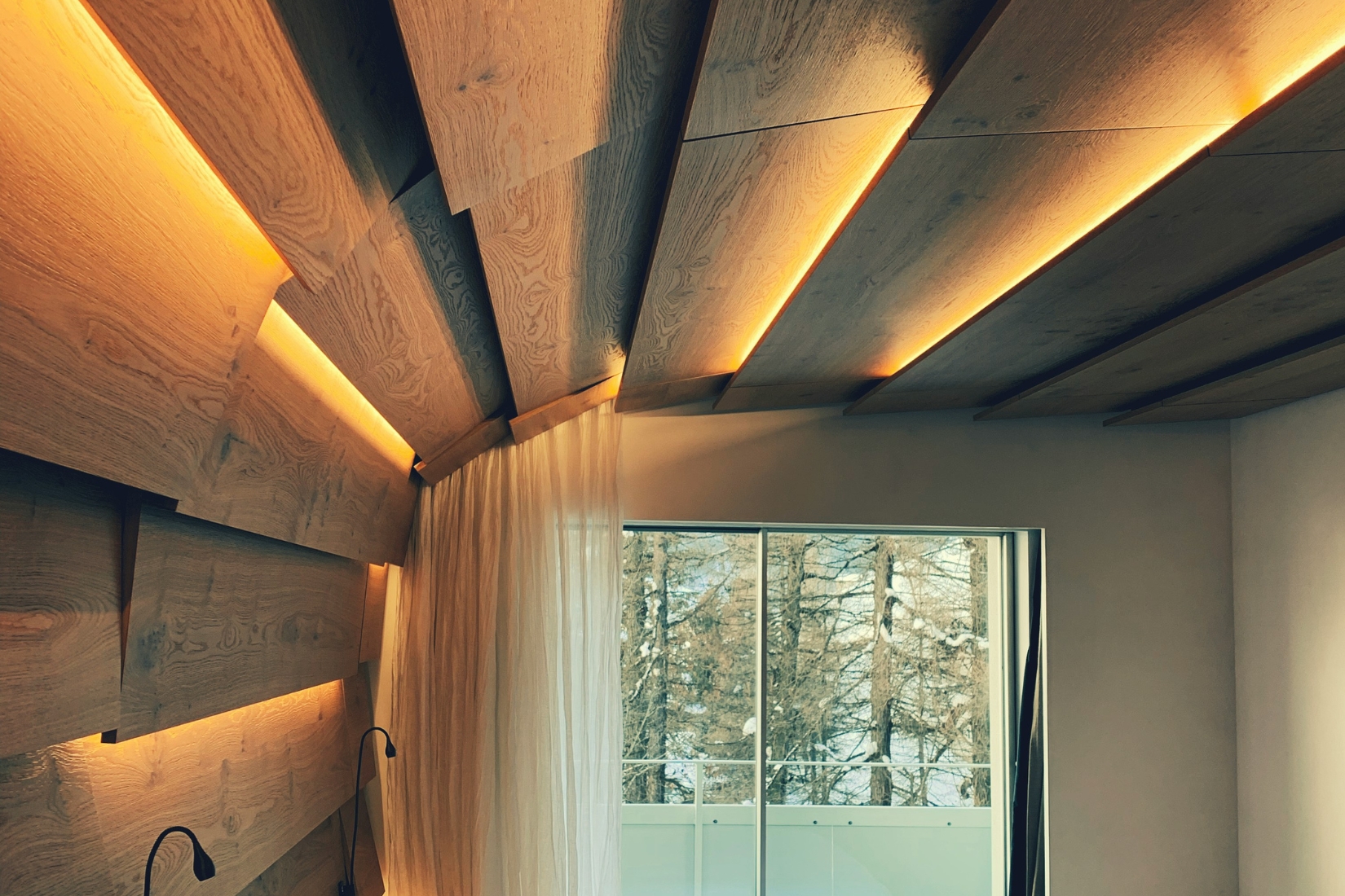 Exposed wooden beams ceiling adding warmth to a cozy living room
