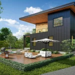 Biophilic interior design living room with indoor plants, natural wood furniture, large windows, and sunlight creating a nature-inspired modern home space.