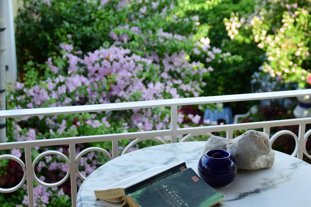cozy reading corner setup on summer balcony