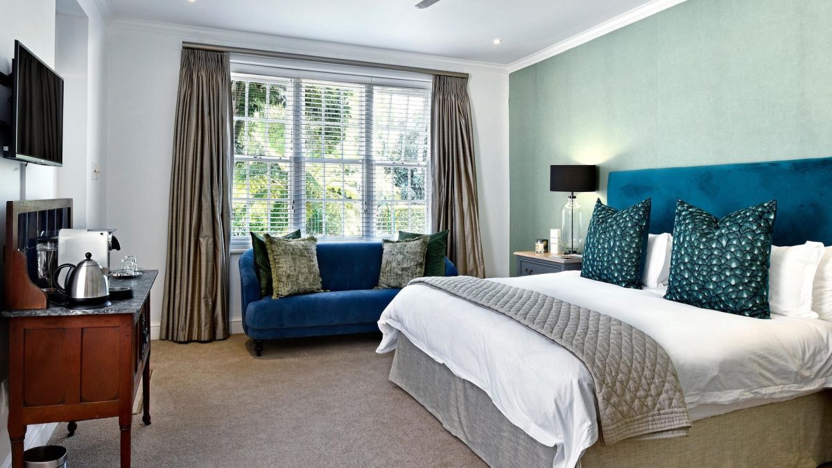 Low profile bed frame in a modern minimalist bedroom