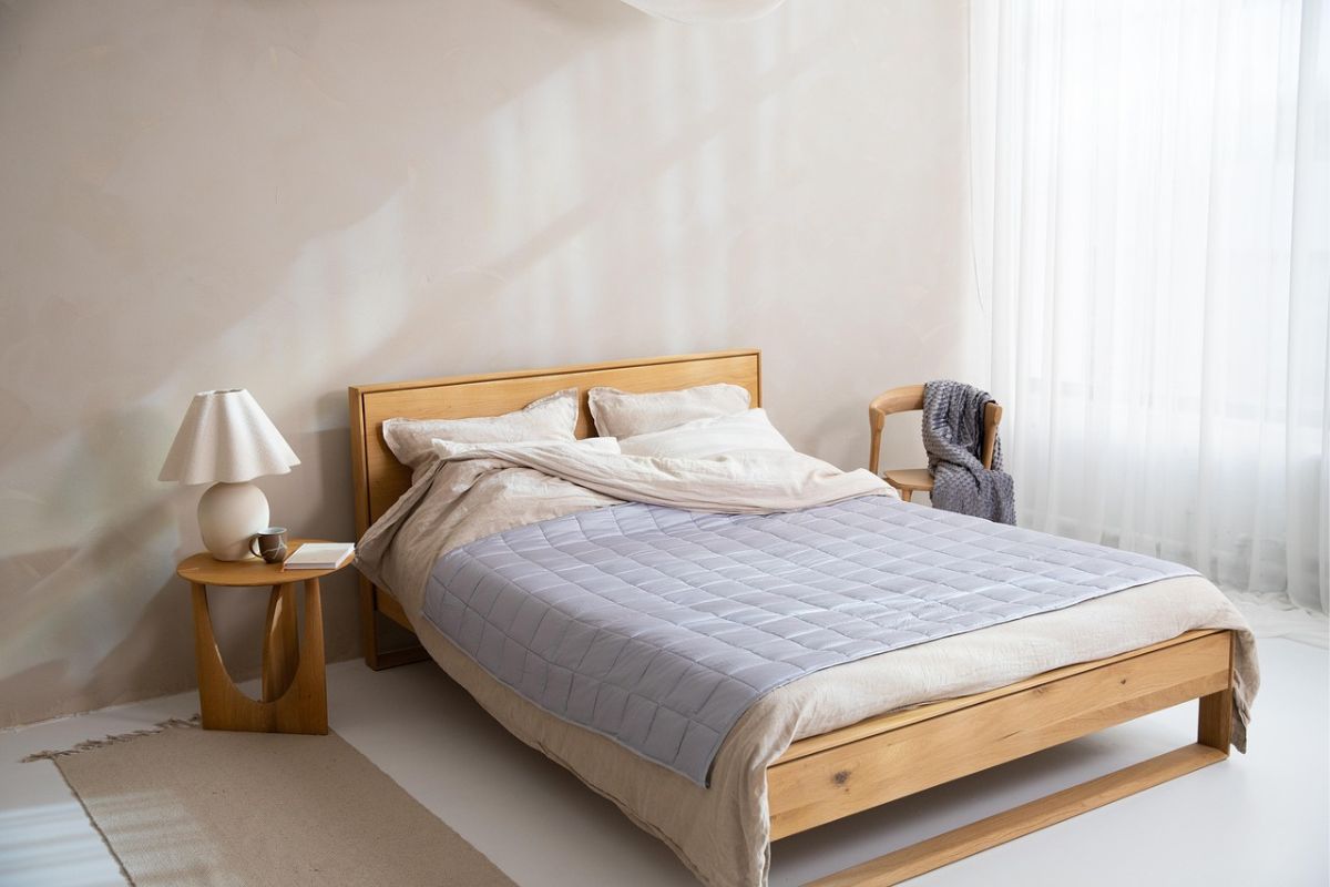 Low profile mattress frame in modern minimalist bedroom