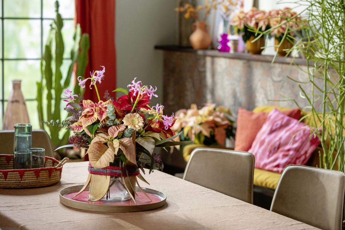 fall dining table styled with pumpkins and candles