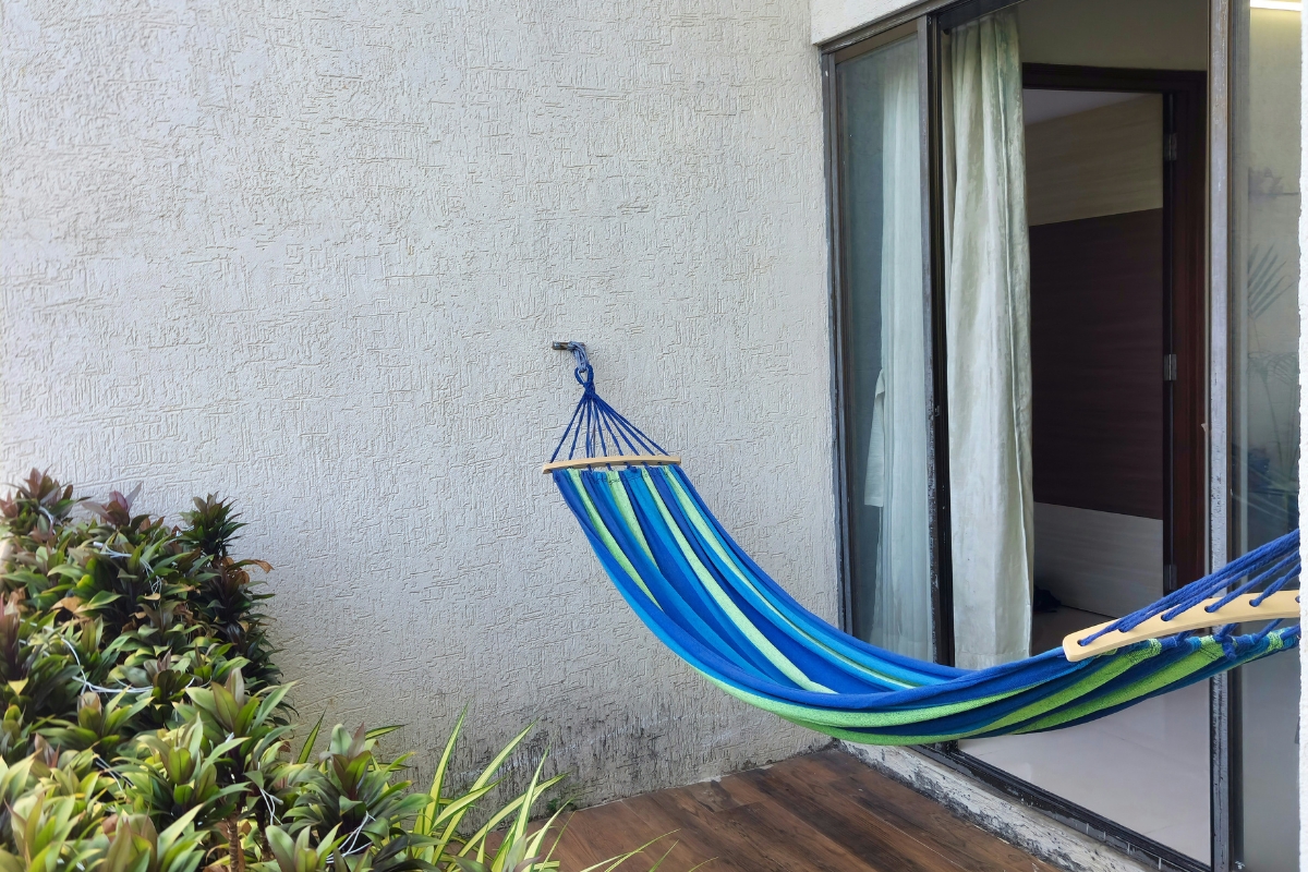 hammock on small summer balcony for relaxing