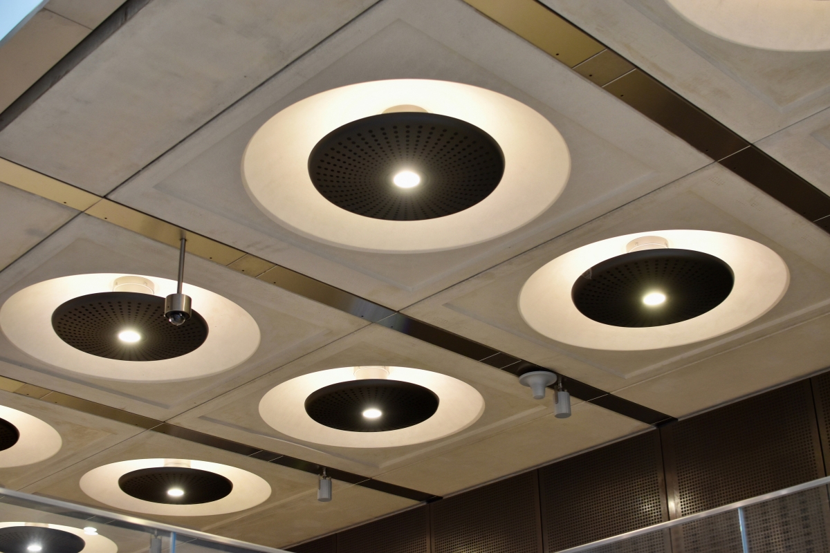 Eco-friendly ceiling design with bamboo panels in a living room