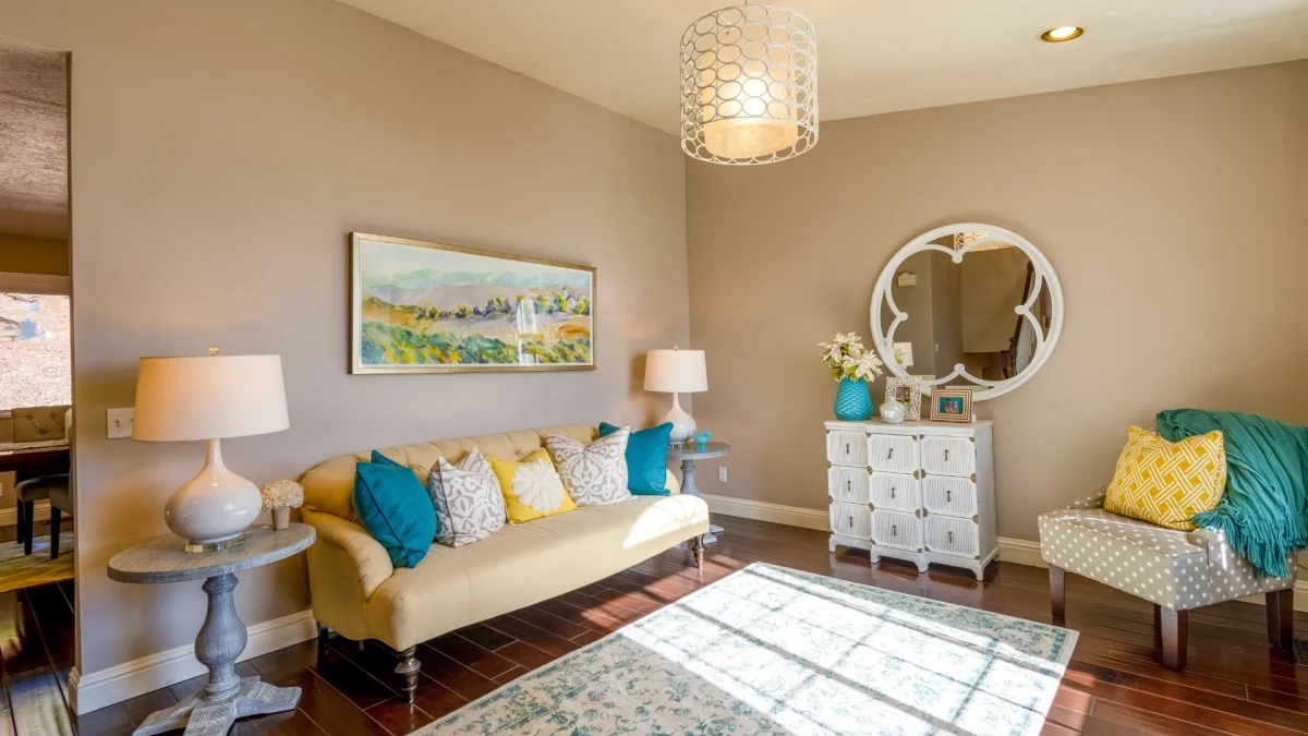 A cozy, elegant living room featuring Monotone Interior Design with neutral tones, stylish furniture, and timeless décor, appealing to everyone.