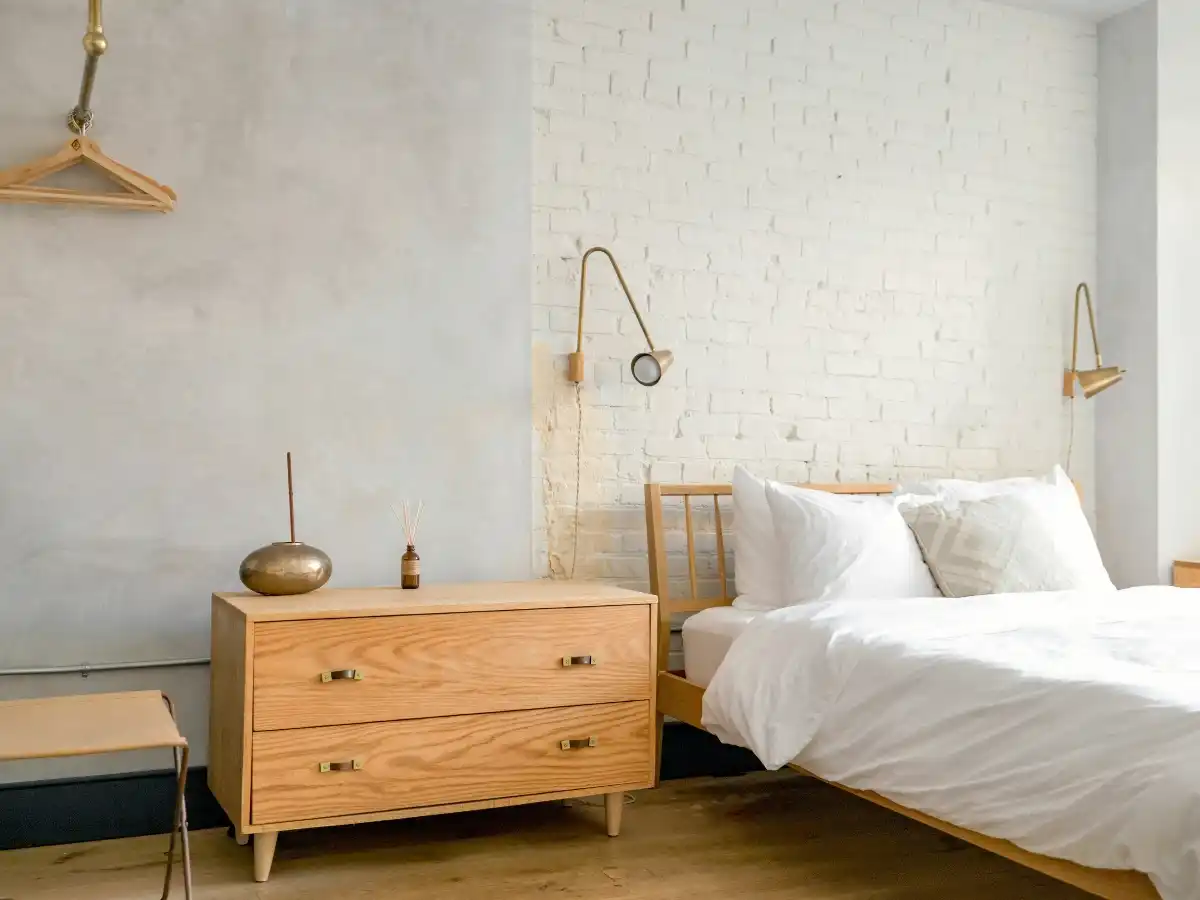 small bedroom design mistakes with mismatched furniture heights in compact room