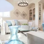 Floating shelf decor ideas featuring books, plants, artwork, and decorative accents in a stylish modern room