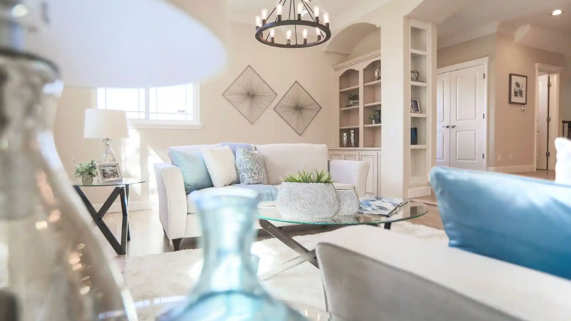 Floating shelf decor ideas featuring books, plants, artwork, and decorative accents in a stylish modern room