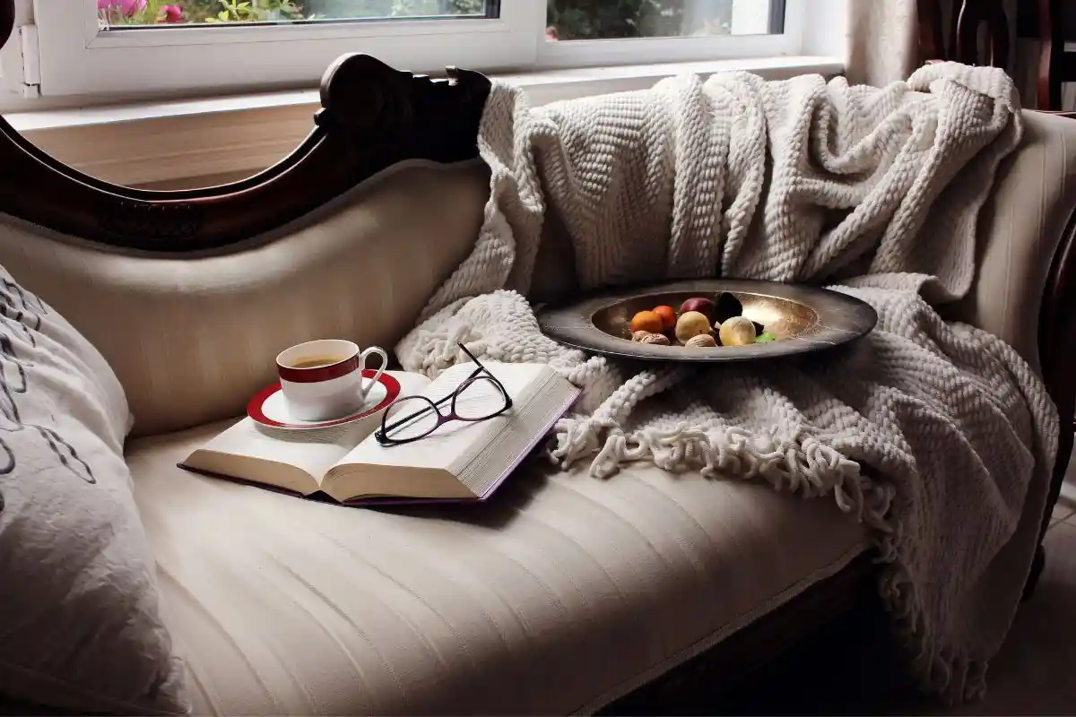 Cozy home ideas with soft blankets, cushions, rugs, and warm textured decor
