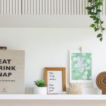 Open Shelf Styling Ideas with books, green plants, baskets, and decorative accents arranged on open shelves